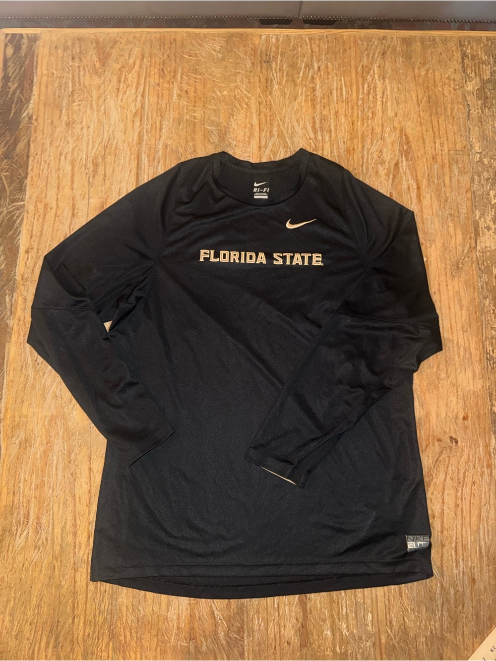 Nike Black Long-Sleeve 'Florida State' Performance Shirt with Gold Logo